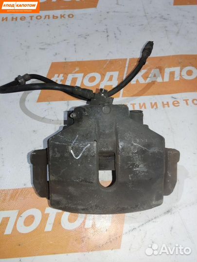 Суппорт тормозной передний правый Volkswagen