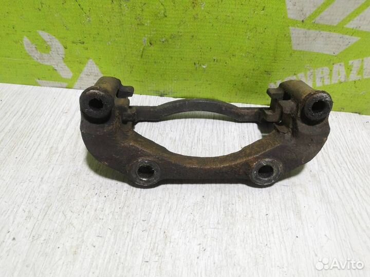 Скоба суппорта переднего Чери Амулет 2006+