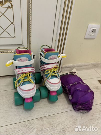 Ролики квадры раздвижные 28-31