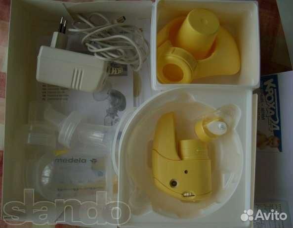 Молокоотсос Medela mini electric