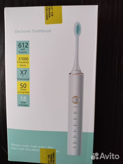 Электронная зубная щетка