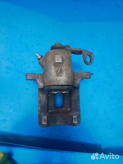 Суппорт тормозной правый задний Skoda Octavia А4