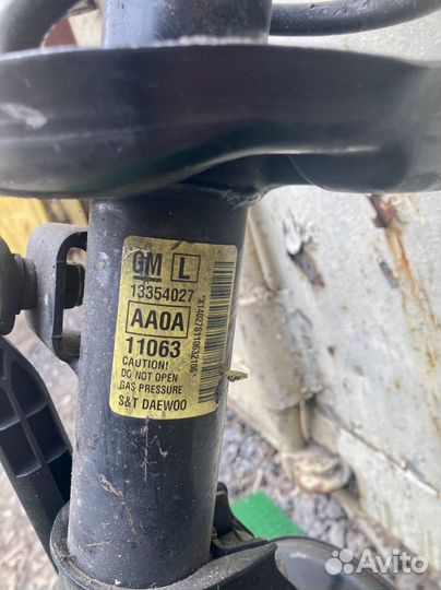 Амортизатор передний левый Opel Astra J