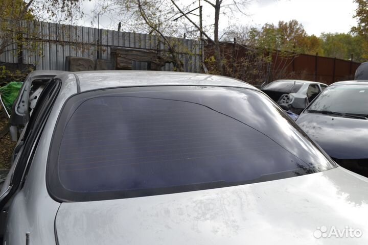 Стекло заднее Kia Spectra