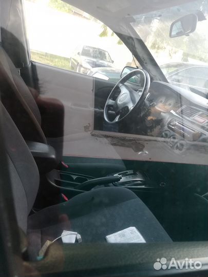 Стекло двери переднее правое Mitsubishi Lancer 9