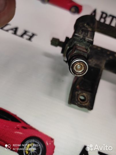 Форсунка инжекторная электрическая Пежо 206