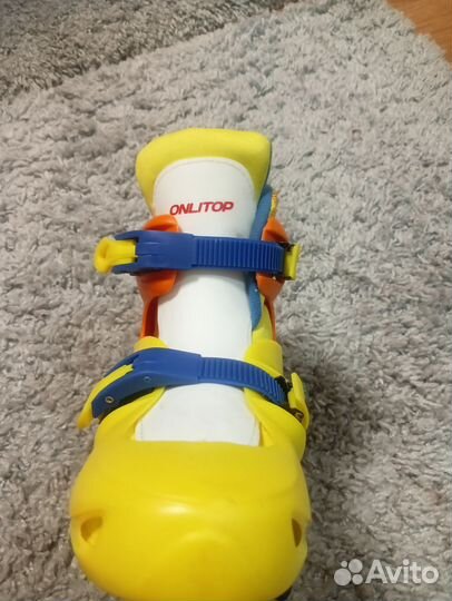 Роликовые коньки