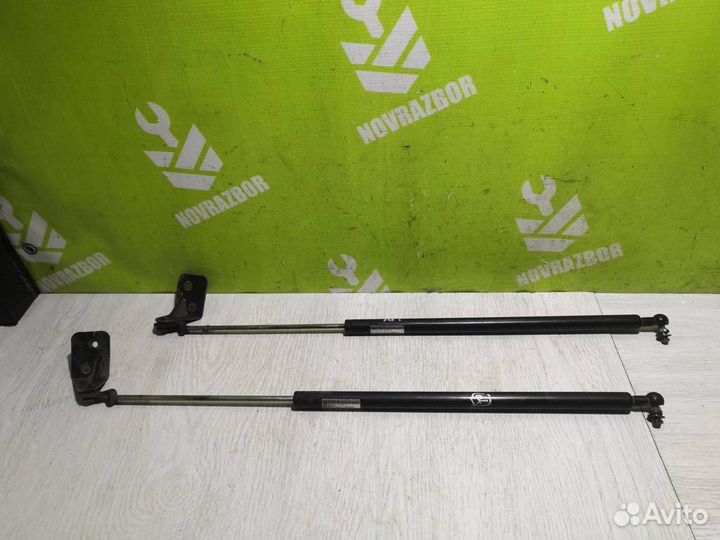 Амортизатор двери багажника Сузуки Балено 98-07