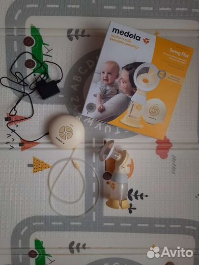 Молокоотсос medela swing flex электрический