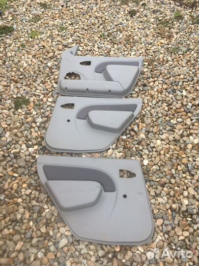 Обшивки дверей Рено Логан 1