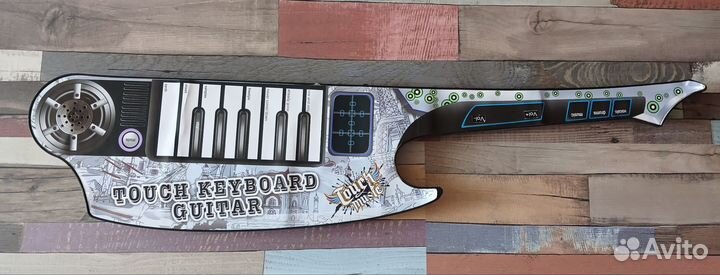 Игрушечная гитара
