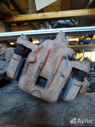 Суппорт тормозной задний правый Hyundai-Kia