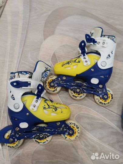 Роликовые коньки