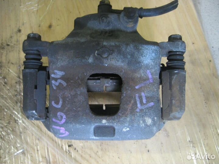 Суппорт перед лево Nissan WGC34, GC35 Silvia '99-'