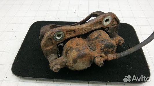 Суппорт тормозной передний левый KIA sorento 1 (93