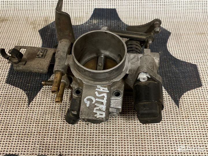 Дроссельная заслонка Opel 90529710