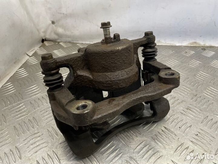 Суппорт тормозной передний правый Nissan X-Trail