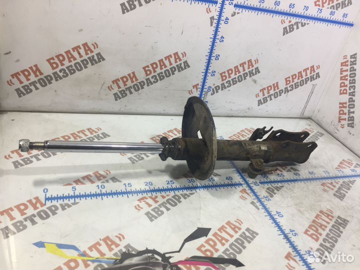 Тойота Камри Амортизатор задний Прав