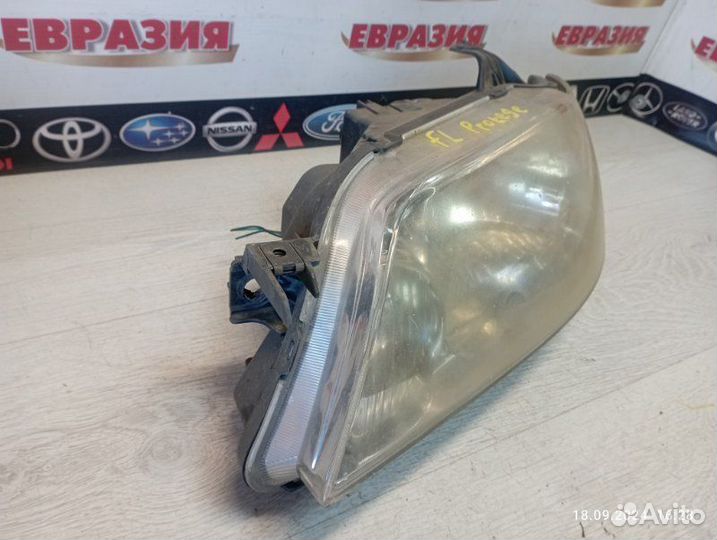 Фара передняя левая Mazda Protege BJ 2002
