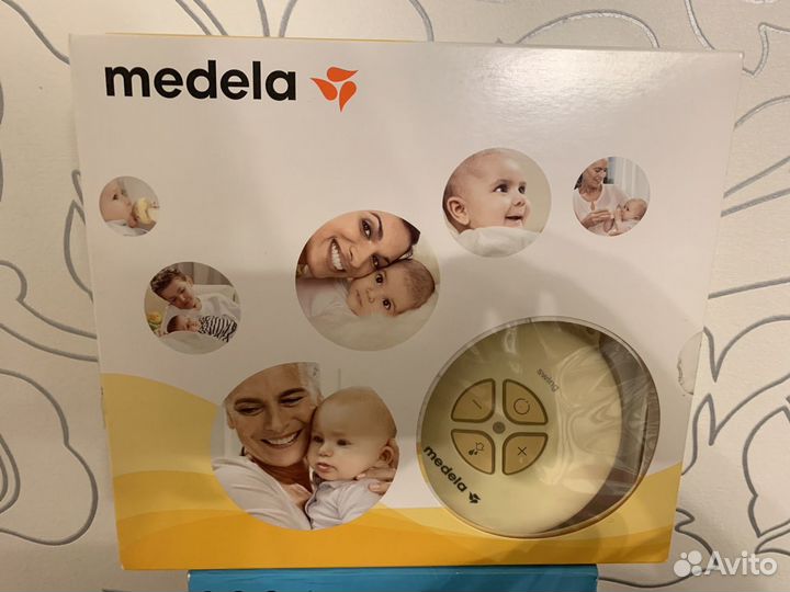 Молокоотсос medela электронный