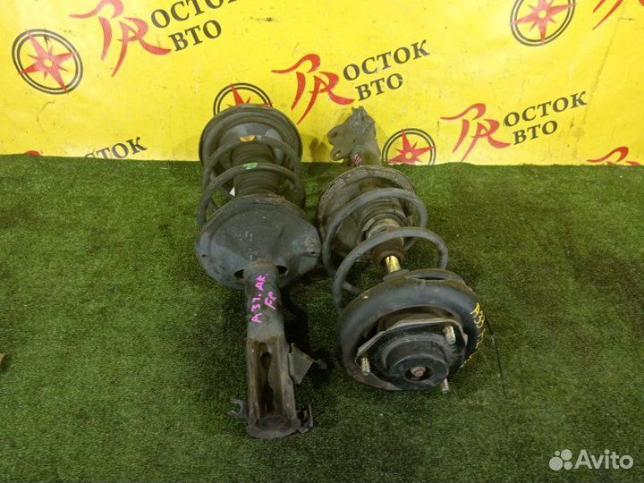 Стойка передняя левая Nissan Cefiro A33 VQ20DE