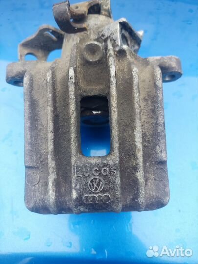 Суппорт тормозной правый задний Skoda Octavia А4