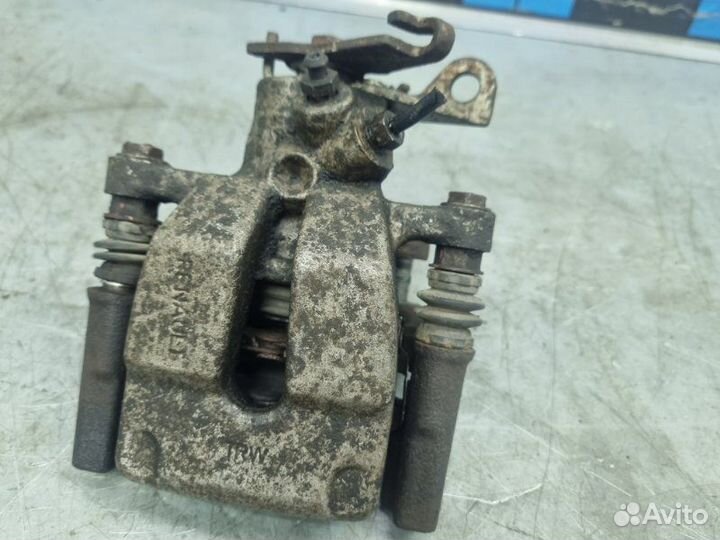 Суппорт тормозной задний правый Renault Fluence