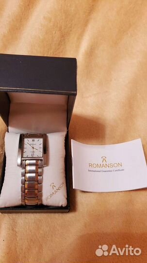 Часы Romanson