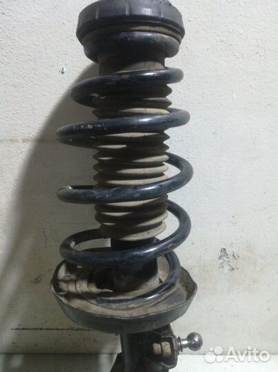 Амортизатор передний передний левый Opel Astra J