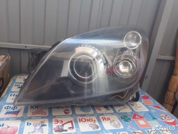 Левая фара,ксенон opel astra h