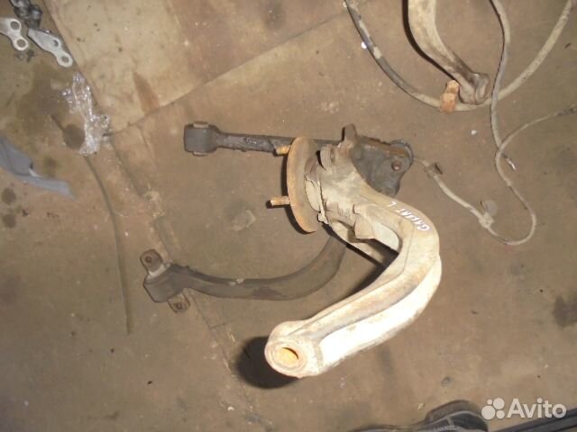 Кулак поворотный передний левый Mitsubishi Galant