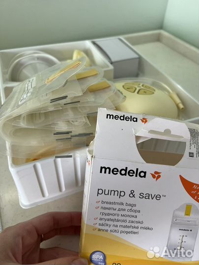 Молокоотсос электрический medela с пакетами