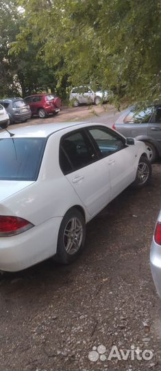 Mitsubishi Lancer 1.3 МТ, 2005, 176 000 км