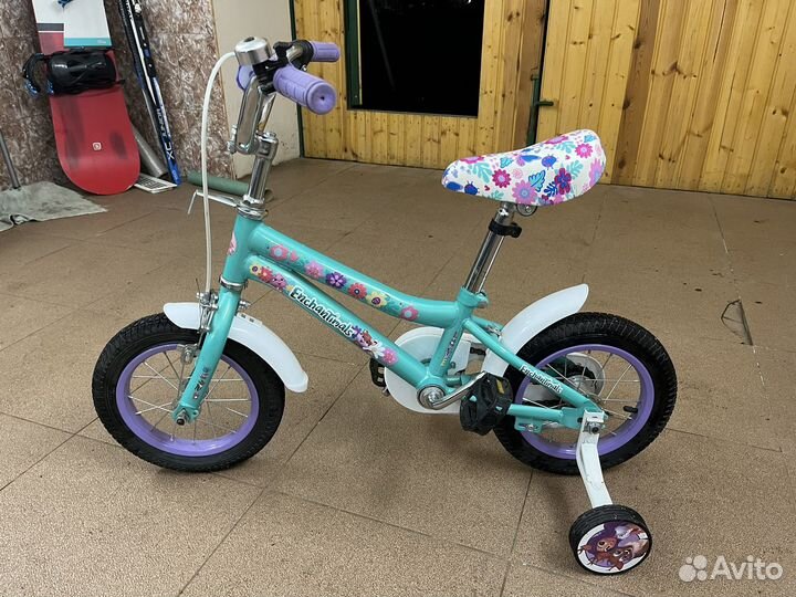Детский велосипед с боковыми колесами