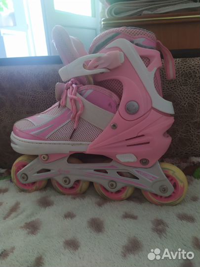 Роликовые коньки