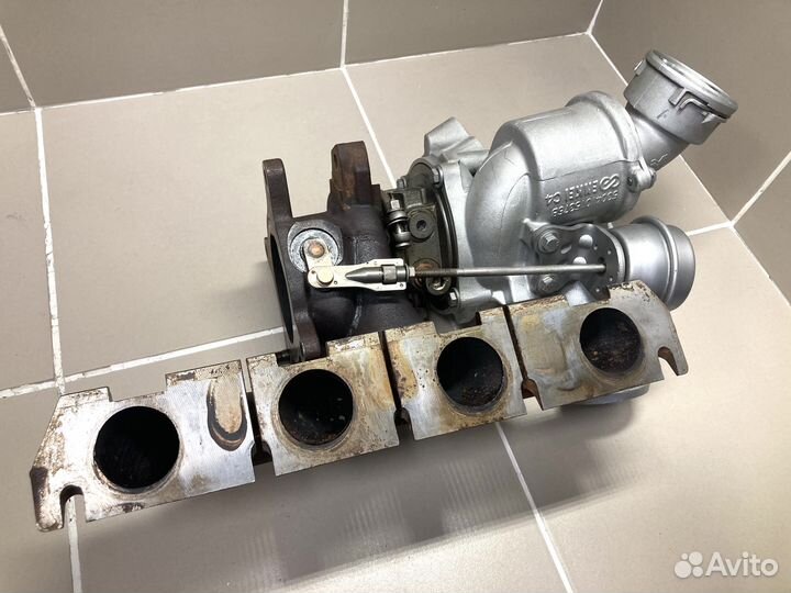 Турбокомпрессор (турбина) 06J145701J VAG