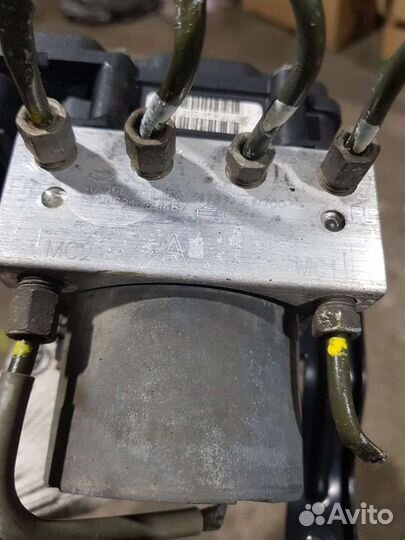 Блок ABS Nissan primera p12