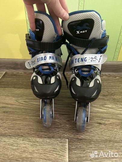 Роликовые коньки