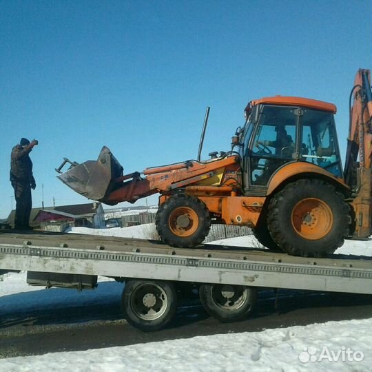 Экскаватор погрузчик с гидромолотом