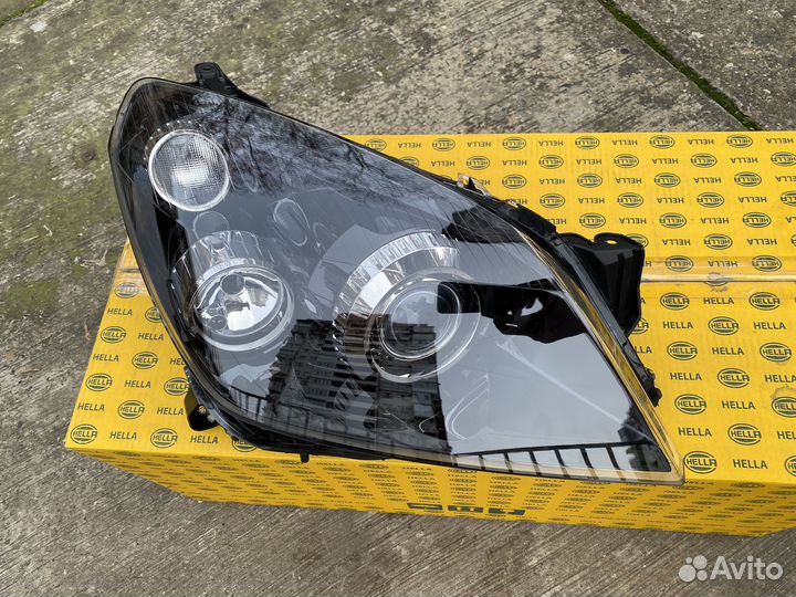 Передняя фара Opel Astra H