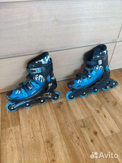 Роликовые коньки