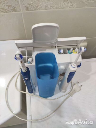 Ирригатор с электрической зубной щеткой