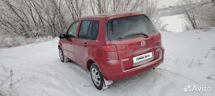 Mazda Demio 1.4 AT, 2002, 154 725 км