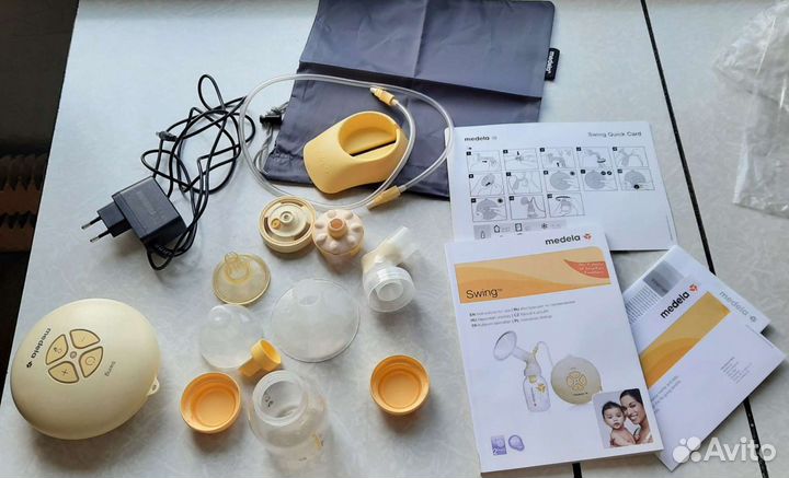 Молокоотсос medela swing