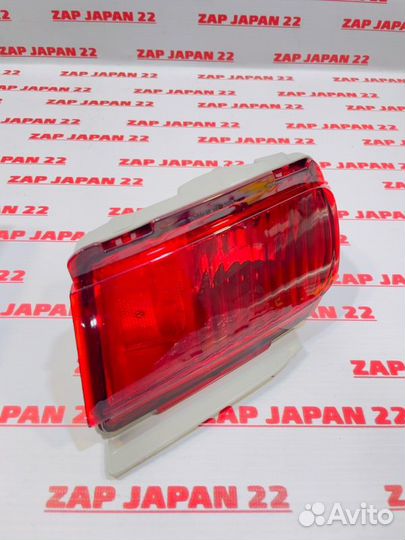 Фонарь противотуманный задний левый Toyota Land