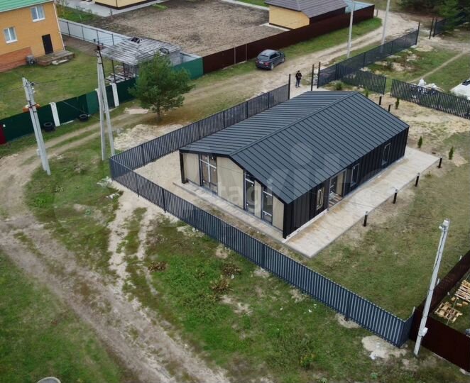 Дом 100 м² на участке 14,1 сот.