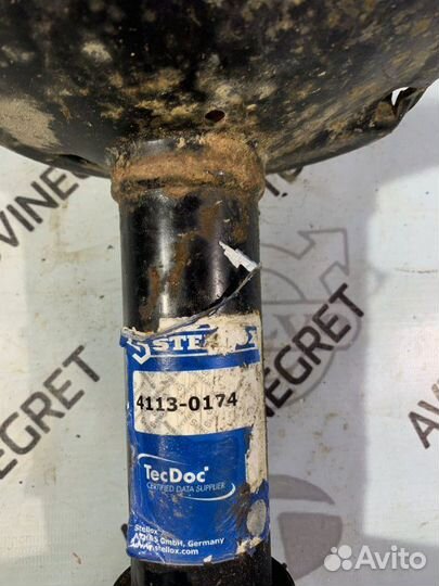 Стойка амортизатор передняя левая Renault Logan 1