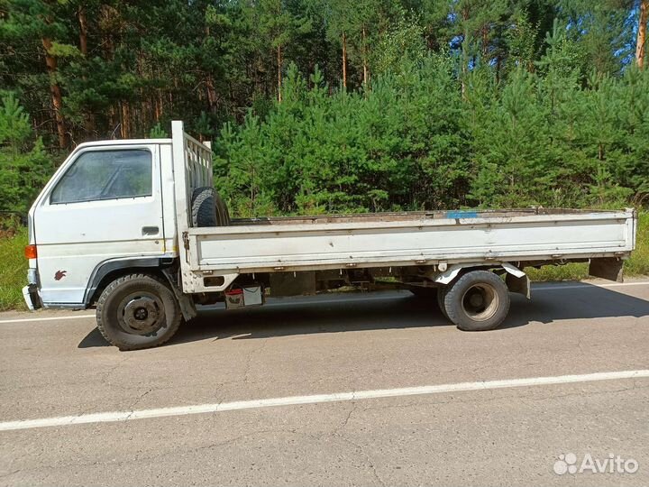 Isuzu Elf, 1990