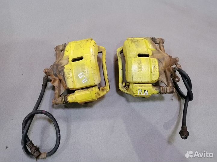 Суппорт тормозной передний Toyota Vista 91