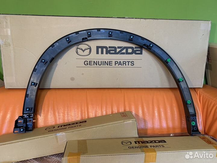 Накладка новая переднего левого крыла Mazda CX-5